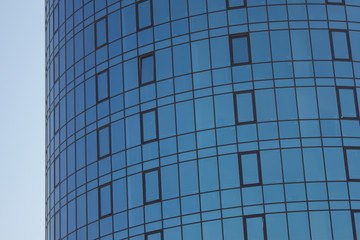Obraz premium Glass wall of modern building skyscraper