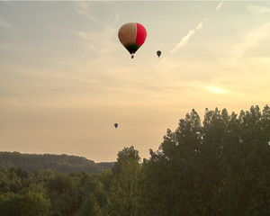 Flight over the forest. Balloons in the sky above the outskirts of Leipzig