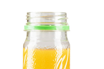open bottle with orange juice