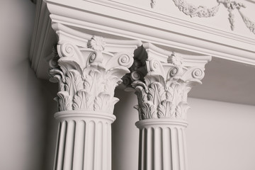 Beautiful living room interior with hardwood floors and fireplace in new luxury home. Vintage living room, retro style. beautiful modern design of the room in delicate light colors decorated