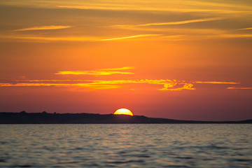Fototapeta na wymiar Sunset over sea