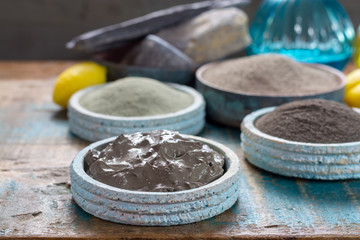 Ancient nature minerals, different types of clay used for skincare, spa treatments, face masks, gray, black, green and blue mud, close up