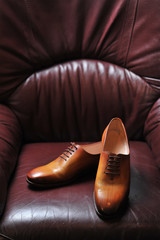 leather shoes handmade on a dark background
