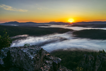Scenic mountain landscape with Mist at summer morning, Russia, Ural.