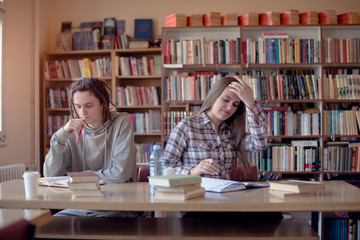 Focused students in library