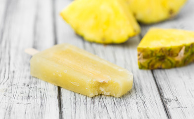 Homemade Pineapple Popsicles (selective focus)