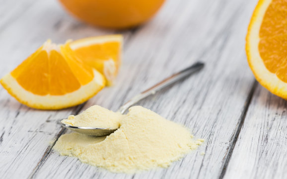 Portion of Orange fruit Powder (selective focus)