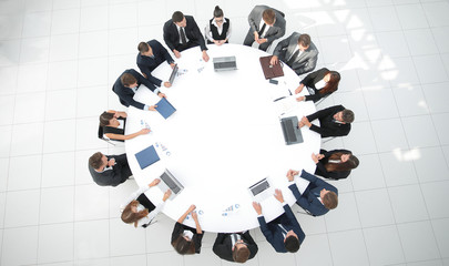 view from the top.meeting of shareholders of the company at the round - table. - obrazy, fototapety, plakaty