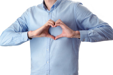 Cropped image of a man making a heart shape with his hands