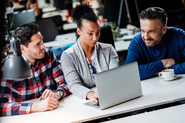 Multi-ethnic colleagues in a coworking office.