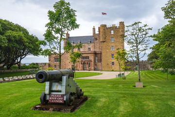 Fototapeta na wymiar A cannon in front of Castle of Mey, Caithness, Scotland, Britain