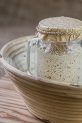 Fototapeta premium The leaven for bread is active. Starter.sourdough. The concept of a healthy diet