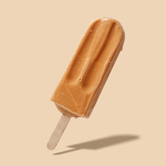 Fruit ice cream on a stick. Bright color, summer mood.