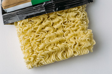 Dry instant noodle, top view, unhealthy asian cheap fast food
