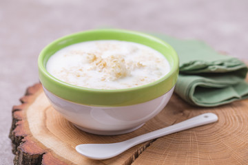 Brazilian winter festival dessert Canjica. White corn porridge