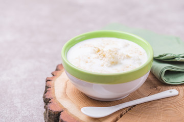Brazilian winter festival dessert Canjica. White corn porridge