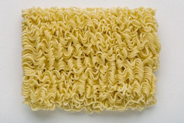 Instant noodles on white background, top view
