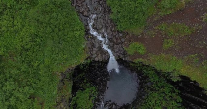 Aerial view of Svartifoss waterfall in Iceland. 4k footage of waterfall.