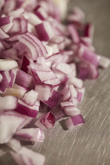chopped bits of Bermuda Onion, sometimes called Red Onion or Bombay Onion