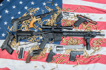 Weapons and ammo on a us flag