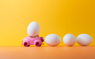 Easter egg on car with copy space for texts.Vintage  color toned for Easter concept background.