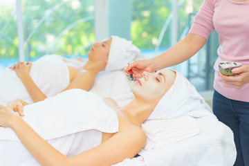 face massage.face mask.beautiful woman relax in spa salon.spa wellness set.beauty and fashion set.spa and wellness center