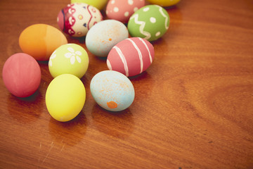 Easter eggs on wooden background
