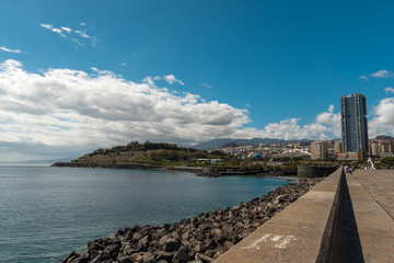 Fototapeta na wymiar SANTA CRUZ, TENERIFE / SPAIN - FEBRUARY 21 2018: Side walk along ocean