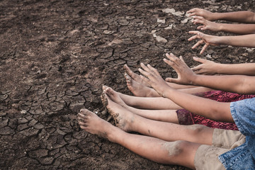 Drought caused by water shortage close up hand and foot.