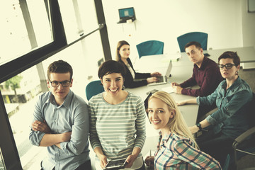 Fototapeta premium group of Business People Working With Tablet in startup office
