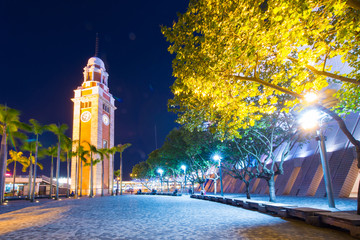 Fototapeta premium The Clock Tower is a landmark in Tsim Sha Tsui at twilight