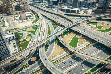 Scenic aerial view of big highway intersection in Dubai, UAE, at daytime. Transportation and communications concept. - 197979492