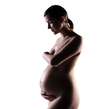 Naked Pregnant Woman With A Huge Beautiful Belly.