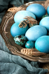 Colorful easter eggs on metal plate