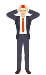 Businessman in Santa hat with surprise expression on face