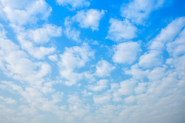 Beautiful fluffy clouds with blue sky background.