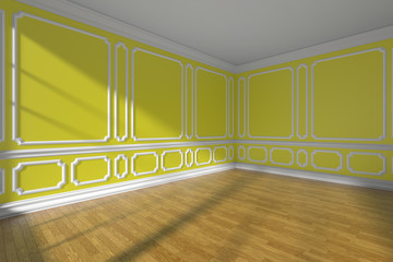 Empty yellow room with molding and parquet wide angle