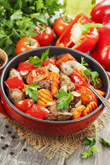 Chicken liver with sweet pepper and tomatoes