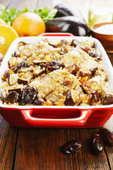 Chicken thigh baked with rice, eggplant and figs