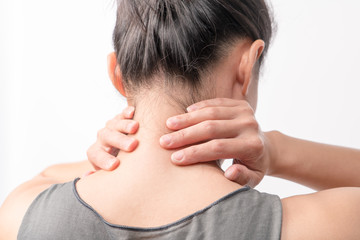 closeup women neck and shoulder pain/injury with white backgrounds, healthcare and medical concept