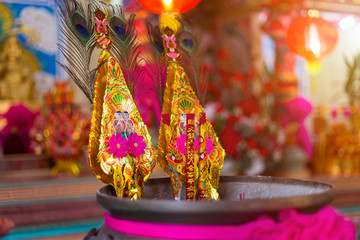 Red candles and burning incense sticks Paper gold for pay respect to god in Chinese New Year day at a Chinese shrine.