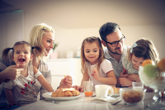 Happy Family Having Breakfast.