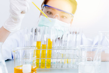 Oil pouring, Formulating the chemical for medicine,Laboratory research, dropping liquid to test tube