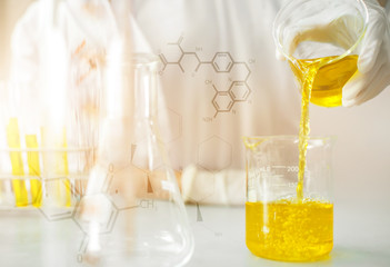 Oil pouring, Formulating the chemical for medicine,Laboratory research, dropping liquid to test tube