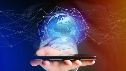 Businessman using smartphone with a Connected network over a earth globe concept on a futuristic interface - 3d rendering