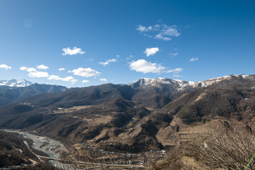 landscape of tree, mountain from the top of mountain a sunny cloudy day