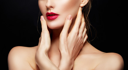 {art of girl face with red lips bright make-up, clean skin, hands near neck and naked shoulders. Beauty facail treatment concept