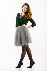 Full body portrait with a beautiful redheaded woman