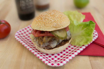 Gourmet BBQ Meat Burger with tomatoes, pickles, cheese and lettuce