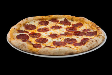 pizza with salami and cheese on black background
